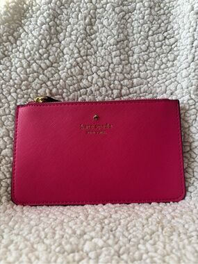kate spade hot pink zip card pouch with gold logo